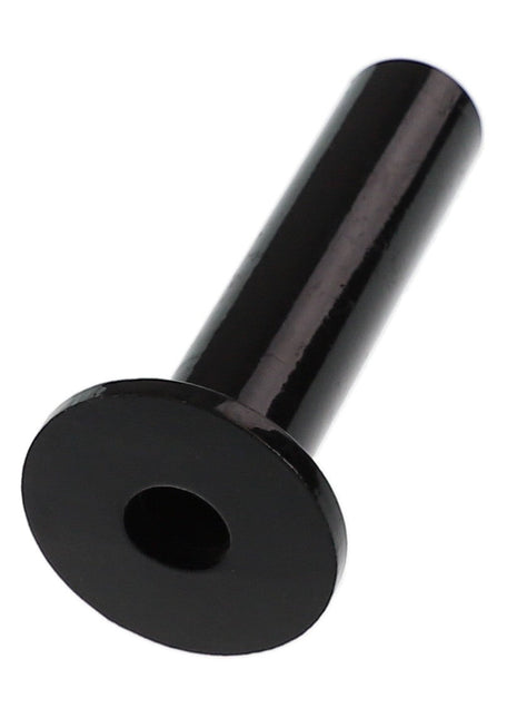 The AGCO Spring Centering Tube - Acp0022610, a sleek cylindrical black metal rod with a flared edge and a central hole, rests elegantly on a pristine white surface.