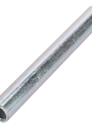 A gleaming AGCO Spacer - Acw0848630, a cylindrical metal tube with a reflective surface and open at both ends, lies horizontally on a pristine white background.