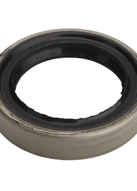 Close-up of the AGCO | Seal - Acw3154110, a circular metallic sealing ring with a black inner rubber component, commonly used in mechanical or automotive applications. Product description information is currently unavailable.