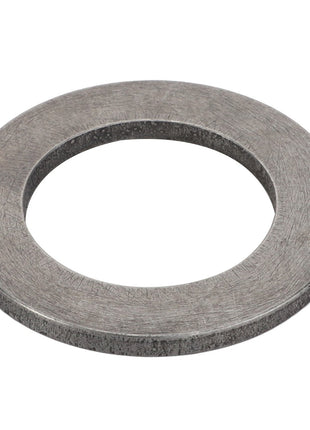 The AGCO | Disc - F178302020322 by AGCO is a sturdy metal washer featuring a perfectly circular shape and a precisely cut hole in the center.