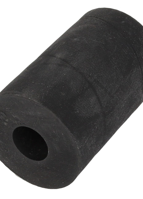 A black, cylindrical rubber AGCO | Bush - Acw1048320 with a central hollow shaft, resting upright on a white background. Please note that no current product description information is available at this time.