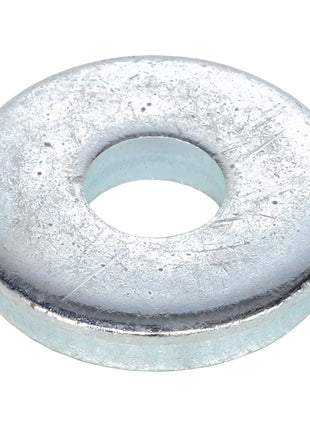 A close-up image of the AGCO | WASHER - AL5013924, a silver metal washer with a central hole, typically used in mechanical assemblies to distribute the load of a threaded fastener.