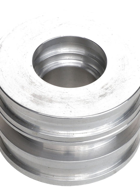 Introducing the AGCO Piston - AG126259, a round metallic multi-grooved pulley with a central hole, designed specifically for mechanical applications. Please note that additional product description information is currently unavailable.