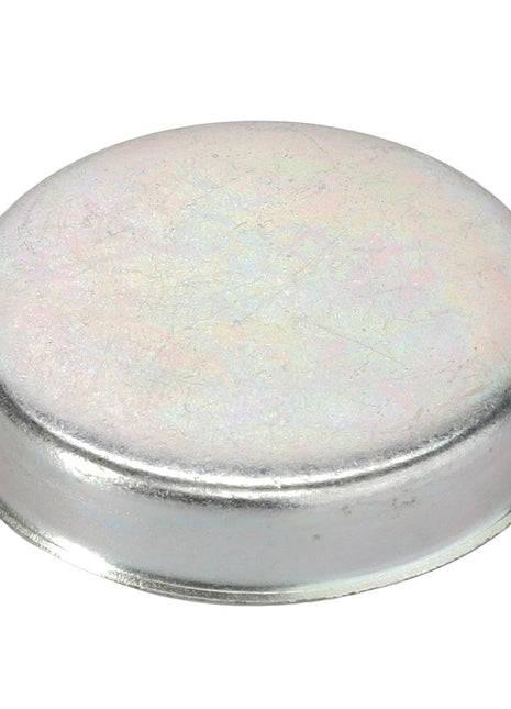 The AGCO Cover - F198300020390 is a circular metallic cap featuring a slightly raised, domed top, specifically designed to cover and protect the ends of cylindrical objects.