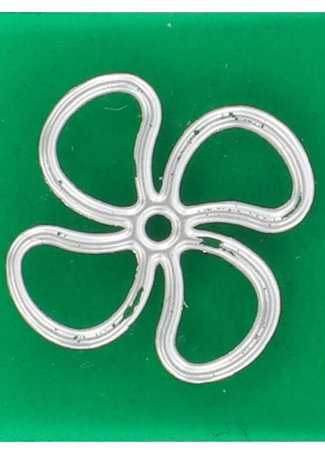 A green square tile featuring a silver outline of a four-petal flower in the center, now identified as the AGCO Symbol Lens for an Air Circulation Fan - V30944900. Further product description details are currently unavailable.