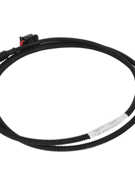 A durable coiled electrical cable from AGCO, known as the Wiring Harness - Acp0226390, features connectors on both ends—one with a sleek black plug and the other with a stylish gray plug.