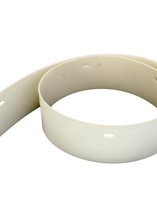 The AGCO Seal - La320718350, a product by AGCO, is a coiled beige plastic band featuring oval-shaped holes at regular intervals.