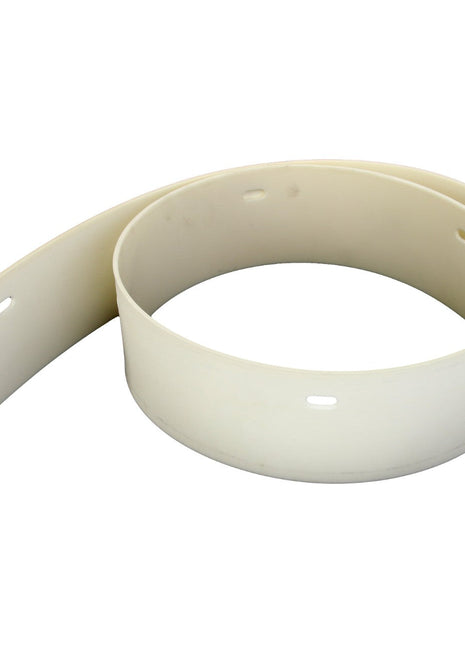 The AGCO Seal - La320718350, a product by AGCO, is a coiled beige plastic band featuring oval-shaped holes at regular intervals.