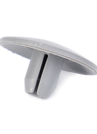 The AGCO | PLUG - V30627400 is a gray plastic clip featuring a flat, round top and two prongs on the bottom designed for secure insertion into a slot. No current product description information is available.