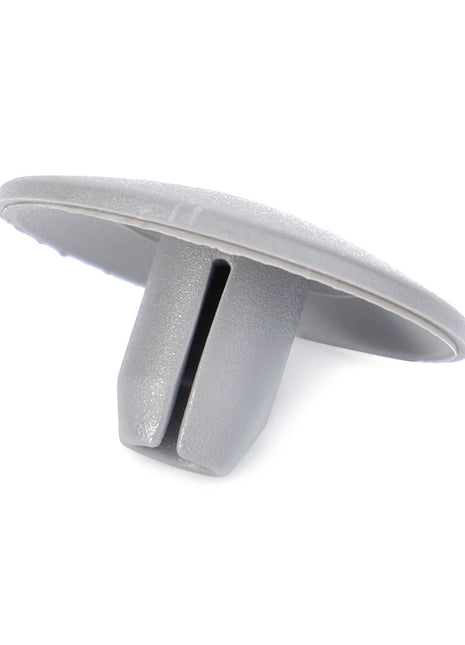 The AGCO | PLUG - V30627400 is a gray plastic clip featuring a flat, round top and two prongs on the bottom designed for secure insertion into a slot. No current product description information is available.