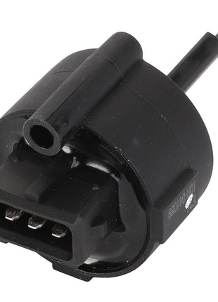 A close-up view of the AGCO Sensor - Acp0310260, a sleek black cylindrical electronic component featuring a three-pronged connector and a protruding pin.