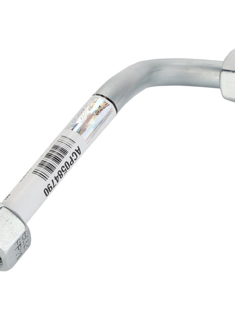 A silver, bent metal hose with hexagonal fittings at both ends, labeled with a barcode and product number ACD9084F190. According to AGCO, this is the Fuel Piping - Acp0584790. No current product description available.