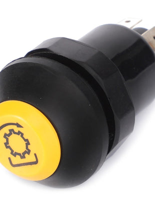 AGCO's Tip Switch (F329900040250) is a yellow and black round push button switch with metal terminals, featuring a gear icon on the button surface. No current product description available.