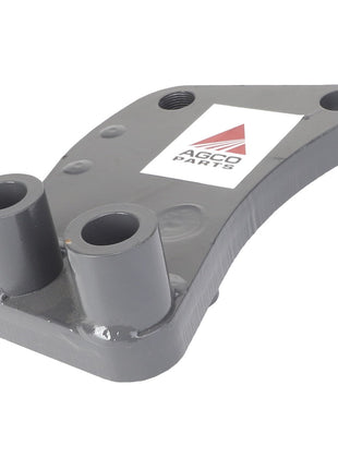 A grey metal component, known as the "AGCO | SUPPORT, RIGHT HAND - AL10411074," featuring two cylindrical openings and an "AGCO Parts" logo on the flat surface. No current product description information is available.