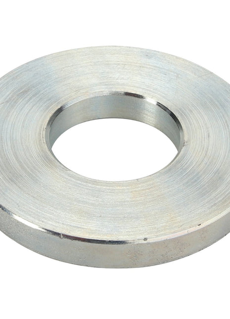 Introducing the AGCO | HINGE - D28182590, a meticulously crafted large circular metal washer designed with a central hole, boasting a smooth polished surface and uniform thickness.