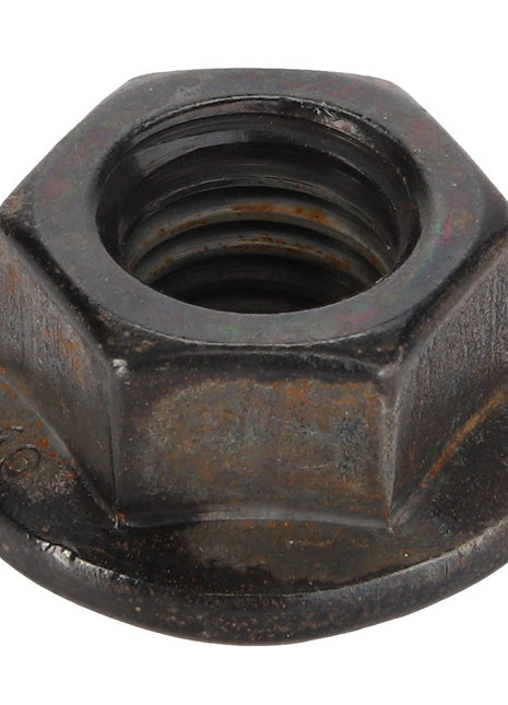 A worn AGCO hex flange nut, model Acx3047670, featuring internal threading and notable signs of wear.