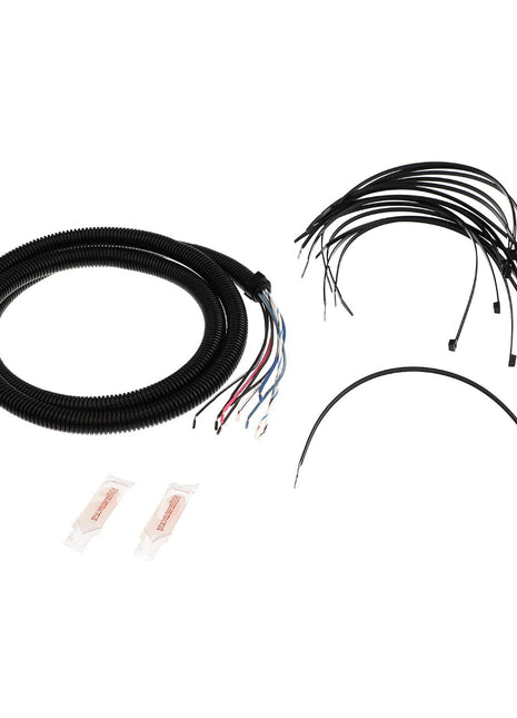 The AGCO | CABLE - AG133087 includes a coiled electrical wiring harness with multiple colored wires, twelve black cable ties, a curved black cable, and two clear packets of electrical connectors. Detailed product description information is currently unavailable for this item.