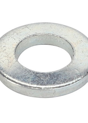 A close-up view of a metallic flat washer with a central hole, offering a detailed look at the AGCO | Disc - Fel115970.