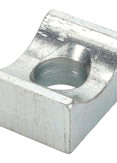 Close-up image of an AGCO CLAMP - D46150560 featuring a metal construction with a square base and a central hole, designed for securing or fastening objects. No current product description information is available.