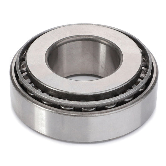The AGCO Taper Roller Bearing - F199300020180, featuring a metallic outer ring and multiple cylindrical rollers, is ideal for managing thrust loads and is displayed on a plain white background.