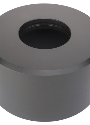 This is an AGCO | Piston Housing - Acw9087410, a cylindrical metal object with a large central hole. The top and bottom surfaces are flat, and the sides are smooth. Currently, no additional product description information is available for this item.