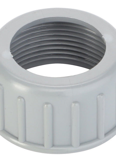 The AGCO Tensioner, Electric Connector (D45020082) is a gray threaded plastic cap featuring vertical ridges for improved grip, likely designed for sealing containers or fittings. Currently, no additional product description information is available.