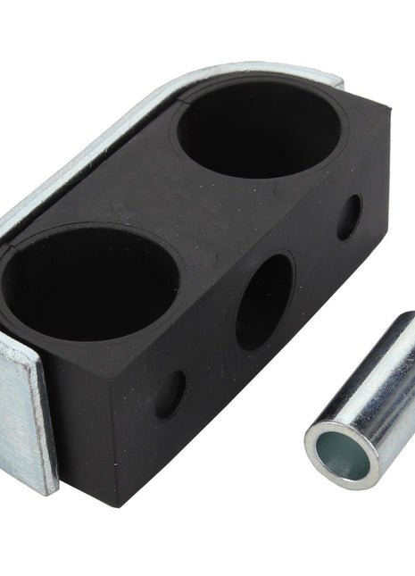 The AGCO Clamp - Acx0133920, combining rubber and metal materials, features two circular holes and one smaller hole in the center. Additionally, there is no product description available for the separate metal insert placed beside it.