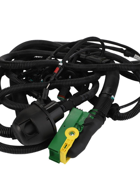 The AGCO | Harness - Acw065137B is a meticulously coiled automotive wiring harness featuring various connectors and cables, highlighted by the distinct green and yellow component for easy identification.