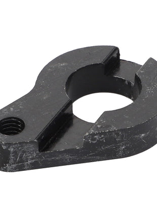 A black, worn metallic clamp piece featuring a central circular cutout and a threaded hole on one end can be referred to as an AGCO Plate - Acx3379290, though it lacks important SEO keywords in its product description.