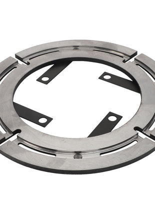 The AGCO Armature - Acw1716010 is a circular metal component featuring four black mounting brackets and multiple evenly spaced radial slots around the outer edge. No current product description information is available.