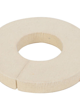 The AGCO Felt Seal - Acw1790510 is a round, beige felt washer featuring a central hole and a small slit on one side; additional details are currently unavailable.