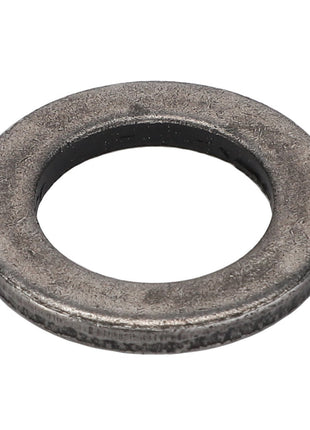 A close-up image of the AGCO Disc - F716300020100, exhibiting a circular metallic design with a central hole. The textured finish of this AGCO washer adds to its rugged appeal.