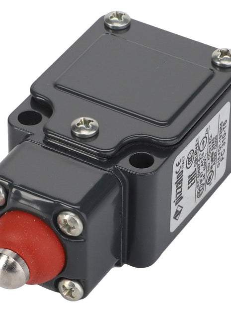 The AGCO | Switch - La320932100 is a black industrial control switch with a prominent red actuator button and four mounting screws. Detailed labeling and certification markings are visible on its side.