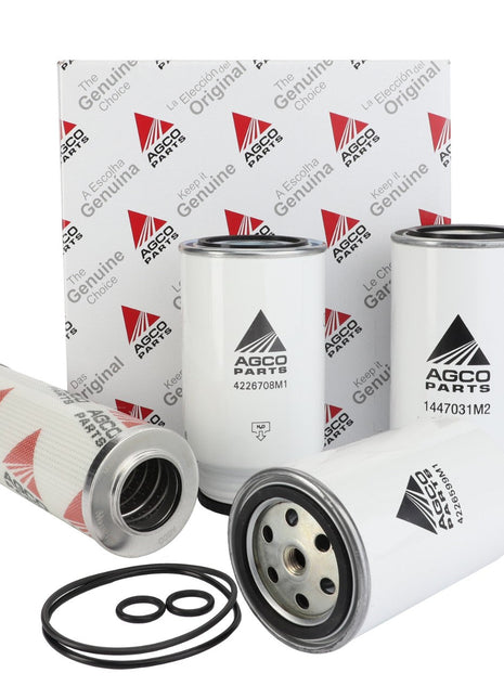 A set of AGCO brand filters and O-rings displayed in front of an AGCO-branded box. The image includes various cylindrical filters labeled with different part numbers, all part of the AGCO | Service Kit - Acp0525330. No current product description available.