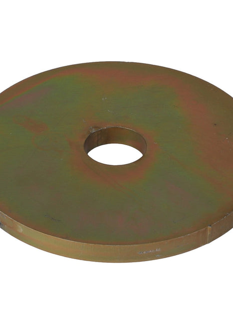 A flat, circular metal disc with a central hole, displaying a tarnished surface. Currently, no product description information is available for the AGCO | WASHER - AG520584 from AGCO.
