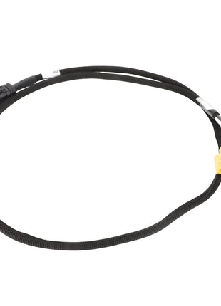 A black electrical wiring harness, labeled as the AGCO Jumper, Cleaning Shoe - Acw9093860 by AGCO, features connectors on both ends—one black and one yellow. No further product description is available for additional details.