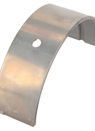 The AGCO Bearing Shell - Acp0357830 is a curved metallic component with a smooth surface and a circular hole near its center.