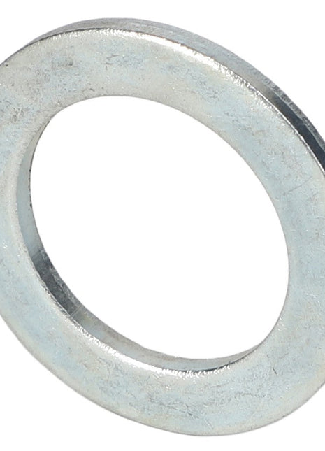 A close-up view of the AGCO Machinery Bushing - Sn2555 from AGCO, a sleek, circular, silver metal washer with a central hole.