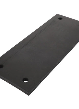 The AGCO Rubber Plate - Fel151139, a rectangular black rubber bumper from AGCO, is designed with durability in mind and features four evenly spaced holes at the corners.