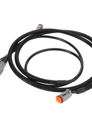 The AGCO | CABLE - AL60015907 is a coiled black wiring harness featuring grey and orange connectors at the ends, suitable for automotive or electronic applications. No current product description information is available.