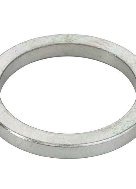 AGCO | Spacer - Acx3586780 by AGCO is a metal washer with a smooth surface and a circular shape, featuring an empty center. Please note that no current product description information is available for further details.
