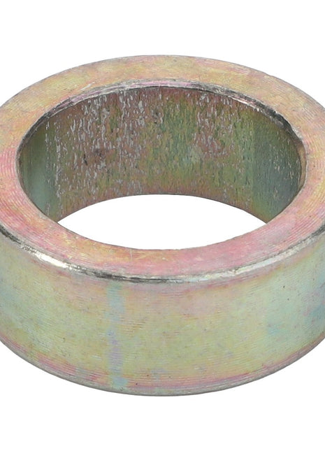 A metallic cylindrical spacer with a hollow center and slightly worn, discolored surface: AGCO | Rachet Jack Spacer Bushing - Sf10050014A.