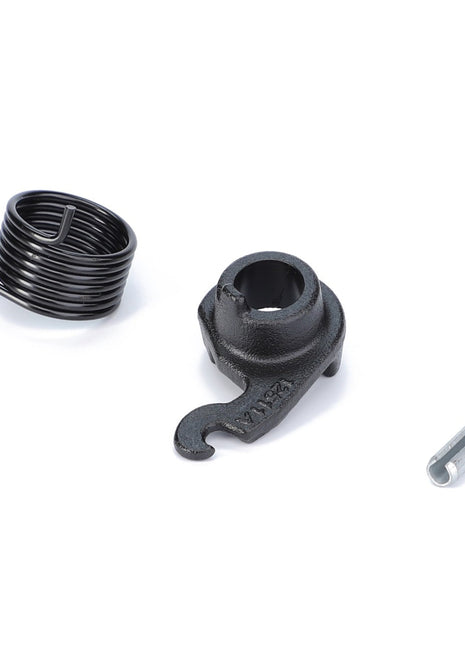 A black coiled spring, a black metal bracket with the marking "VW 32," and a metal cylindrical piece, likely components of an AGCO Tension Lever, Coupling Bolt, Automatic Clevis (F816500070040), are placed on a white surface.