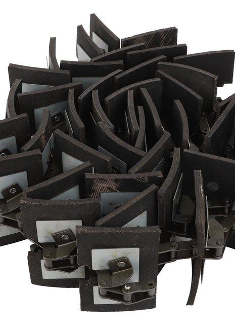 A cluster of AGCO | Grain Elevator Chain Assembly - Acx008027B brackets, known for their high fatigue strength, is arranged in an overlapping pattern.