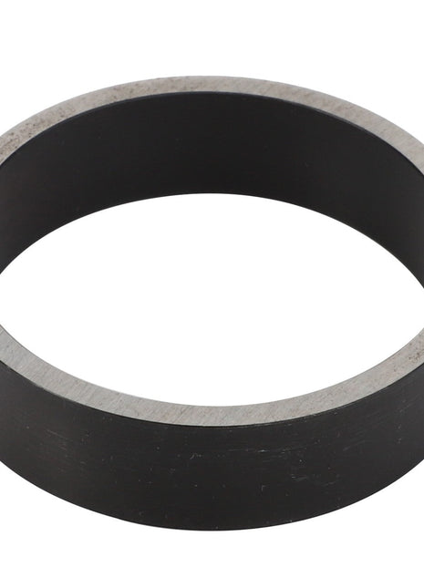 An AGCO | RING - F716300020208, a cylindrical metal ring with a sleek black and silver finish, possibly a sophisticated mechanical component.