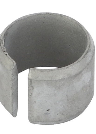 The AGCO Tensioner Bush - F119200210340 is a cylindrical metal ring with a slit opening, potentially used as a component part.