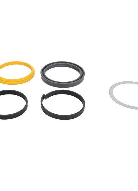 The AGCO Seals Kit - Acp0351690, a collection of five rings in varying colors including one grey, two black, one yellow, and one dark grey, is elegantly showcased against a minimalistic white background. As of now, there is no detailed product description available.