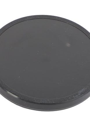 A black circular coaster or lid with a smooth surface, identified as the AGCO | Seal Cap - Acp0287200 by the brand AGCO, is shown against a plain white background. No current product description available for this item.