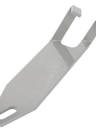 The AGCO | PLATE - D28788591, a flat, metallic bottle opener from AGCO, boasts a sleek, one-piece design featuring a convenient hole at one end for hanging and a V-shaped notch at the other end to effortlessly open bottles.