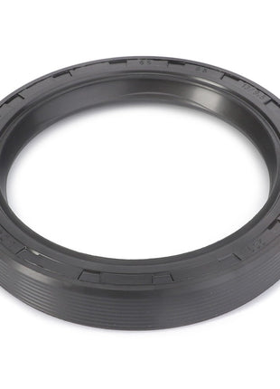 A shaft seal named AGCO | Shaft Seal - F283101150080 from the brand AGCO, featuring a circular black rubber design with ridged edges and numerical markings along the inner rim. No current product description available for similar items.